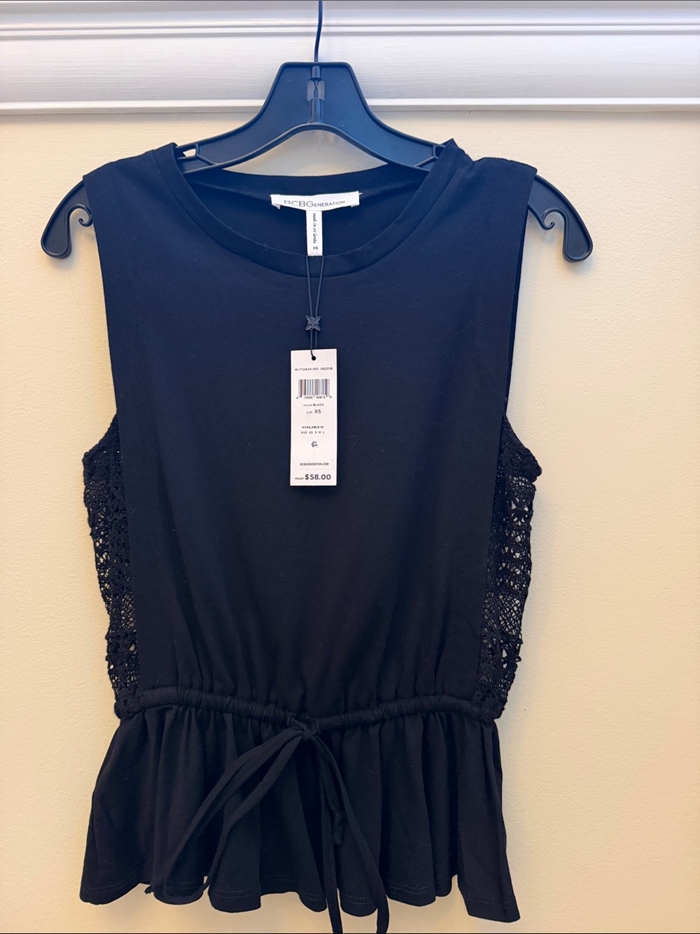 BCBGeneration Black Sleeveless Peplum Top with Lace Sides